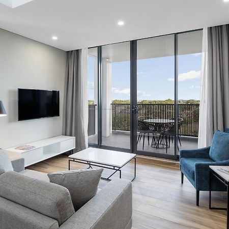 فندق أجنحة ميريتون كاورد ستريت، ماسكوت سيدني المظهر الخارجي الصورة Living room